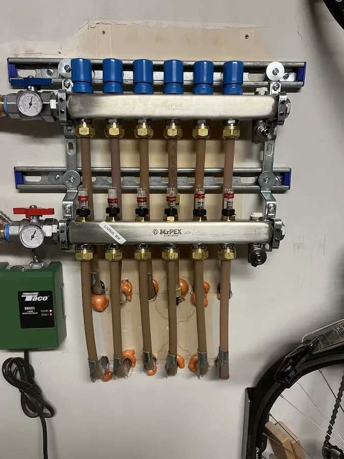 Plumber performing Gas Leak Detection at a residential property in Aldan